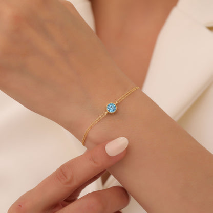 Round Blue Topaz Bezel Bracelet in 14K Solid Gold | December Birthstone