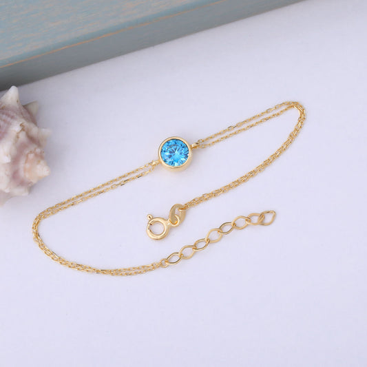 Round Blue Topaz Bezel Bracelet in 14K Solid Gold | December Birthstone