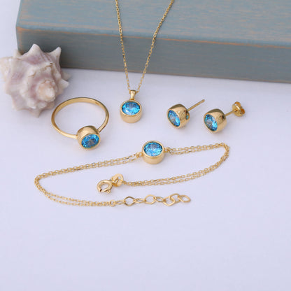 Round Blue Topaz Bezel Bracelet in 14K Solid Gold | December Birthstone