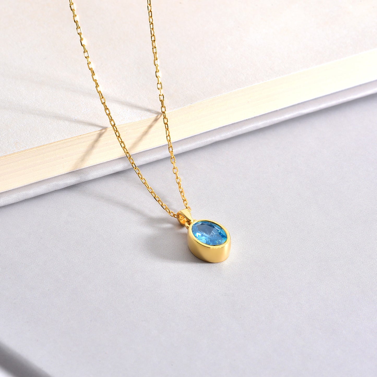 Oval Blue Topaz Bezel Necklace 14K Solid Gold, December Birthstone Charm Pendant