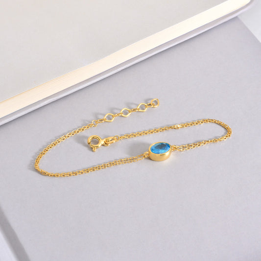 Oval Blue Topaz Bezel Bracelet in 14K Solid Gold, December Birthstone