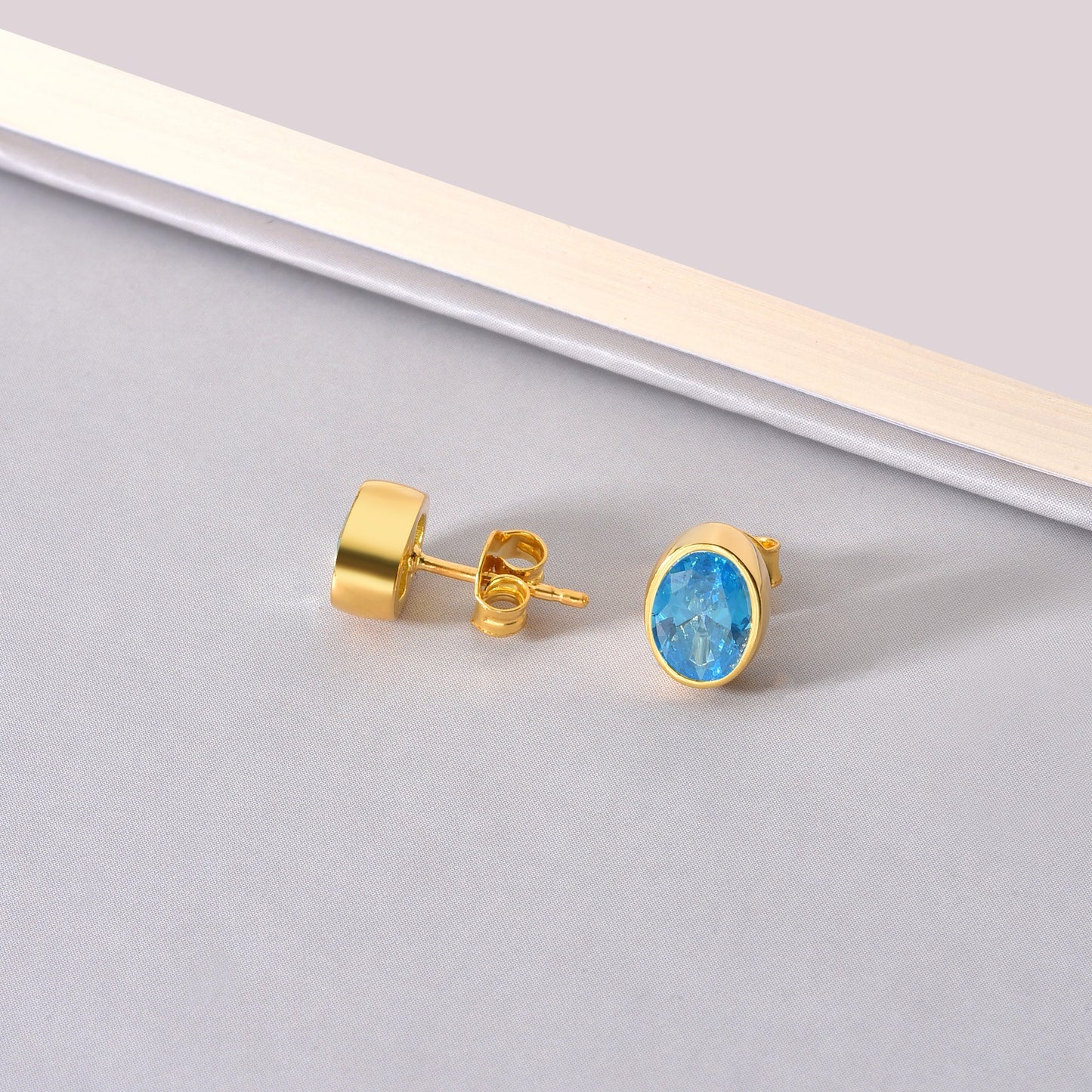 Oval Blue Topaz Bezel Stud Earrings in 14K Solid Gold, December Birthstone