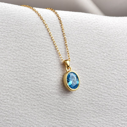 Oval Blue Topaz Bezel Necklace 14K Solid Gold, December Birthstone Charm Pendant